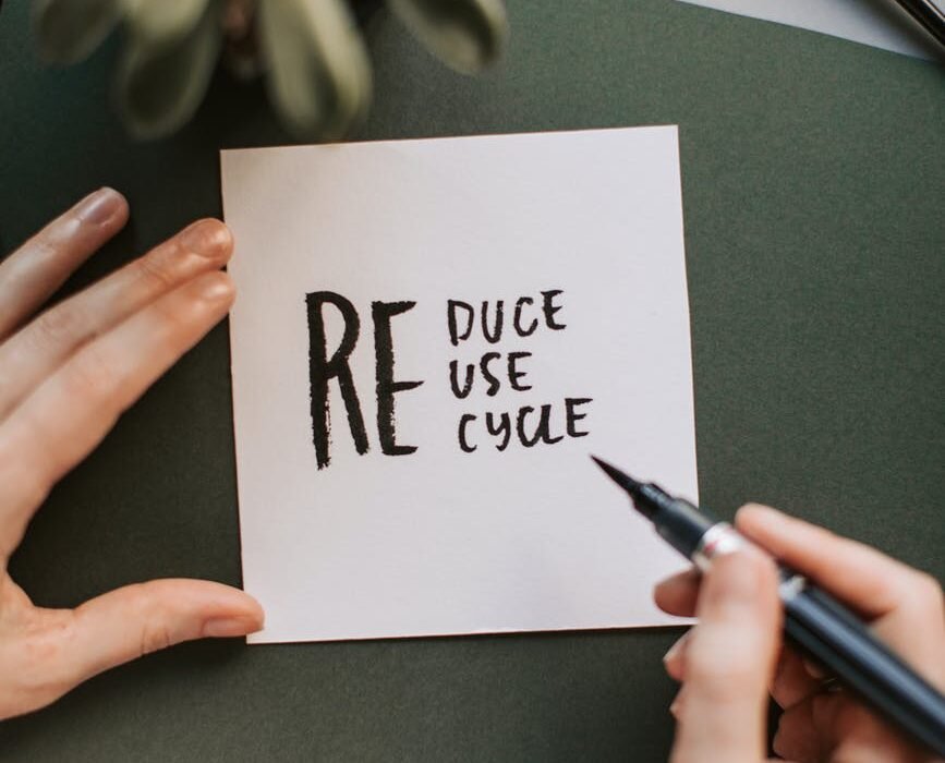 photo of person holding pen